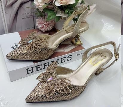 Gold butterfly shoe