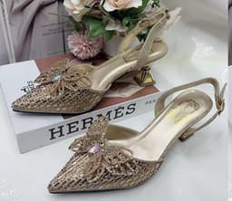 Gold butterfly shoe